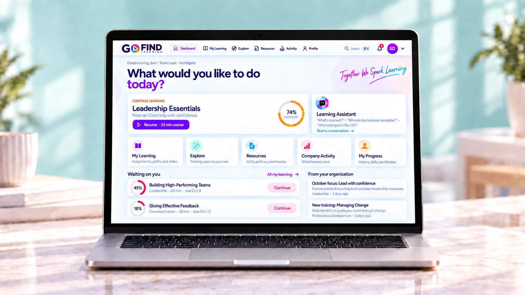 Go Find Learning platform showing Leadership Essentials on a laptop